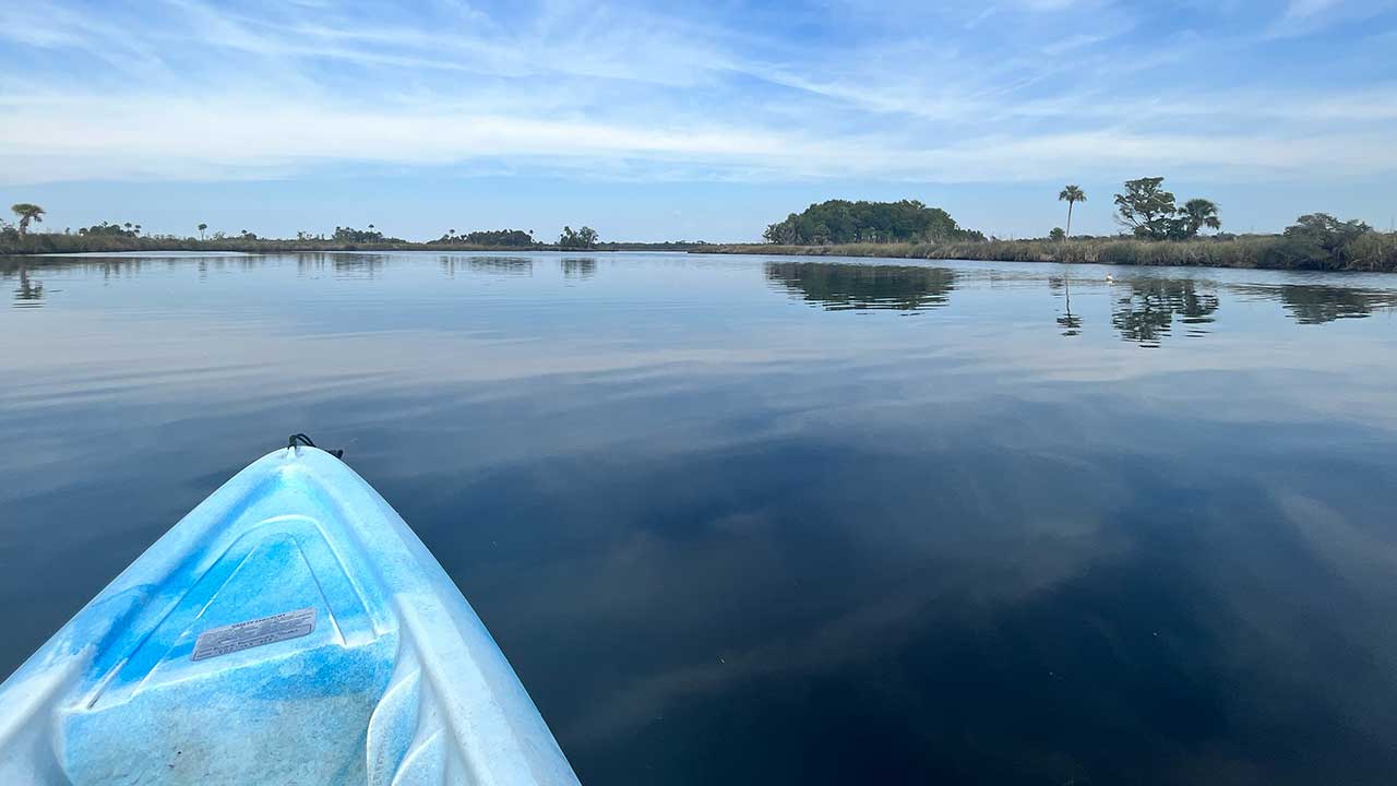 Morning Kayak on still water 1280 by 720