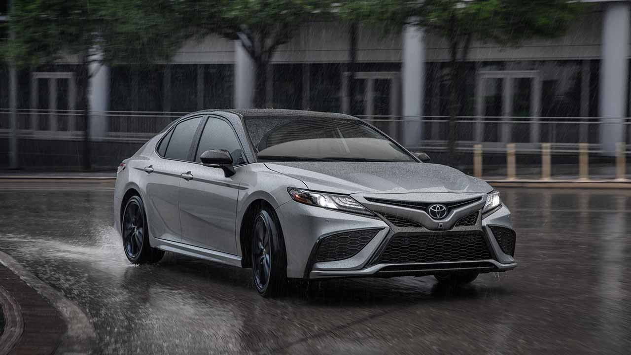 2023 Toyota Camry on wet road