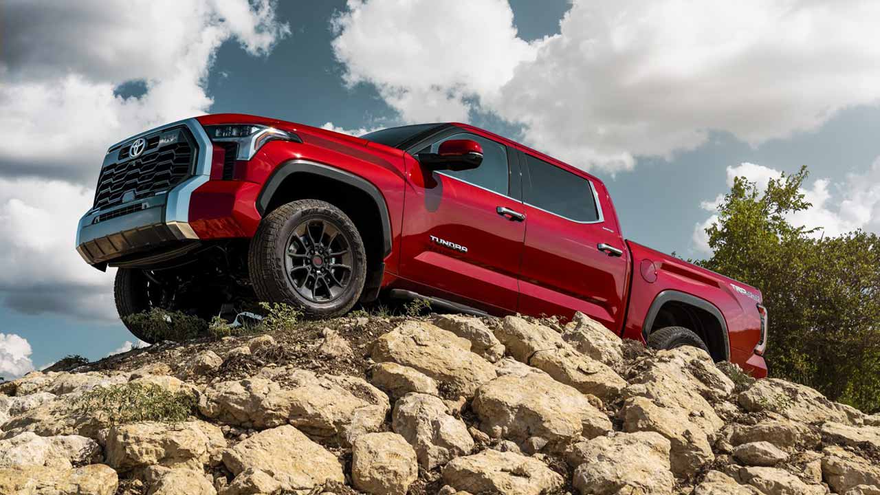 2023 Toyota Tundra climbing a high rise of rocks
