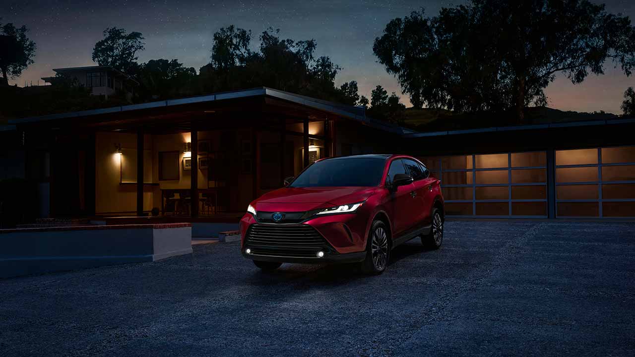 2023 Toyota Venza on driveway of a home at night