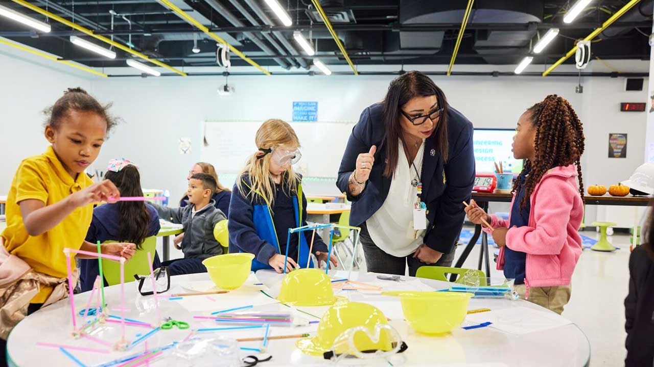 Children in Atlanta with Teacher working together