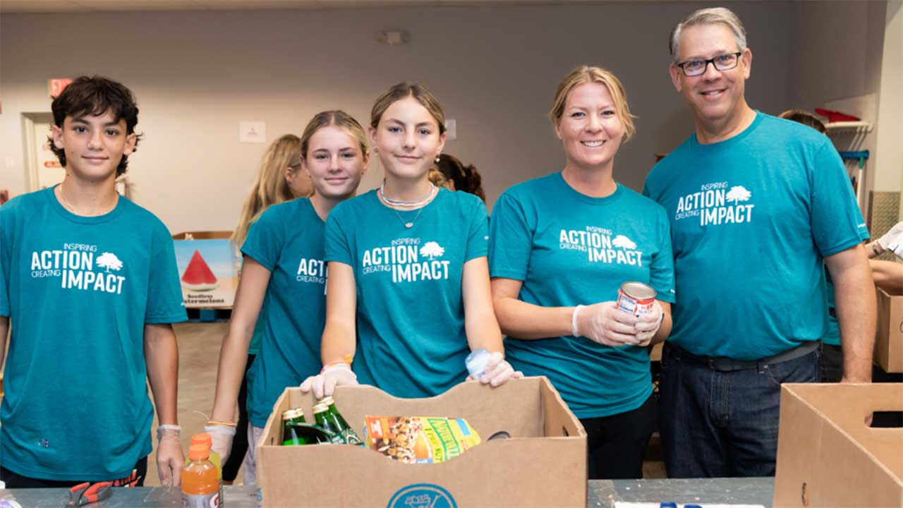 JM Family Associates working at a food bank