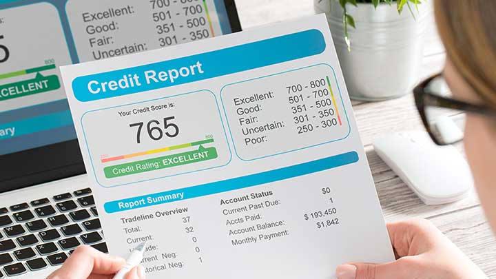 credit series 3 720 by 500 woman reading FICO score
