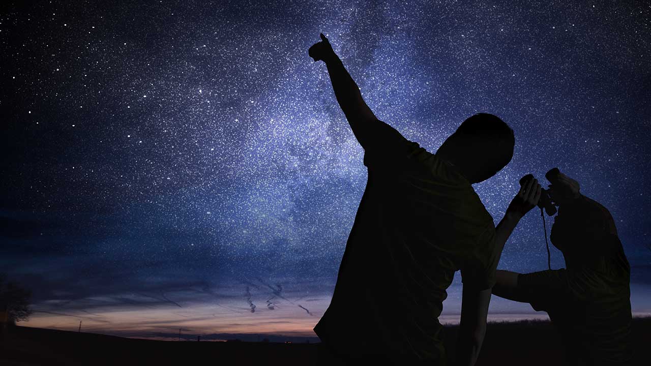 A couple viewing a starry night