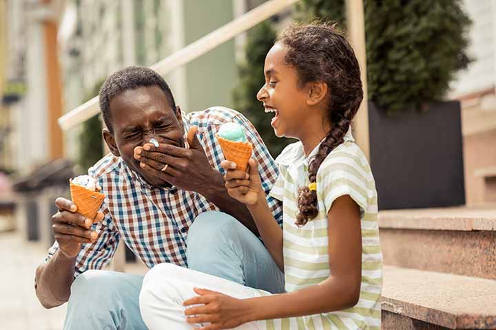 Father and Daughter eating ice cream on the stoop - thumbnail image