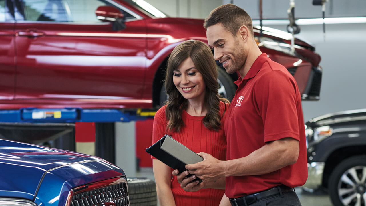 Jan and Toyota technician inspecting