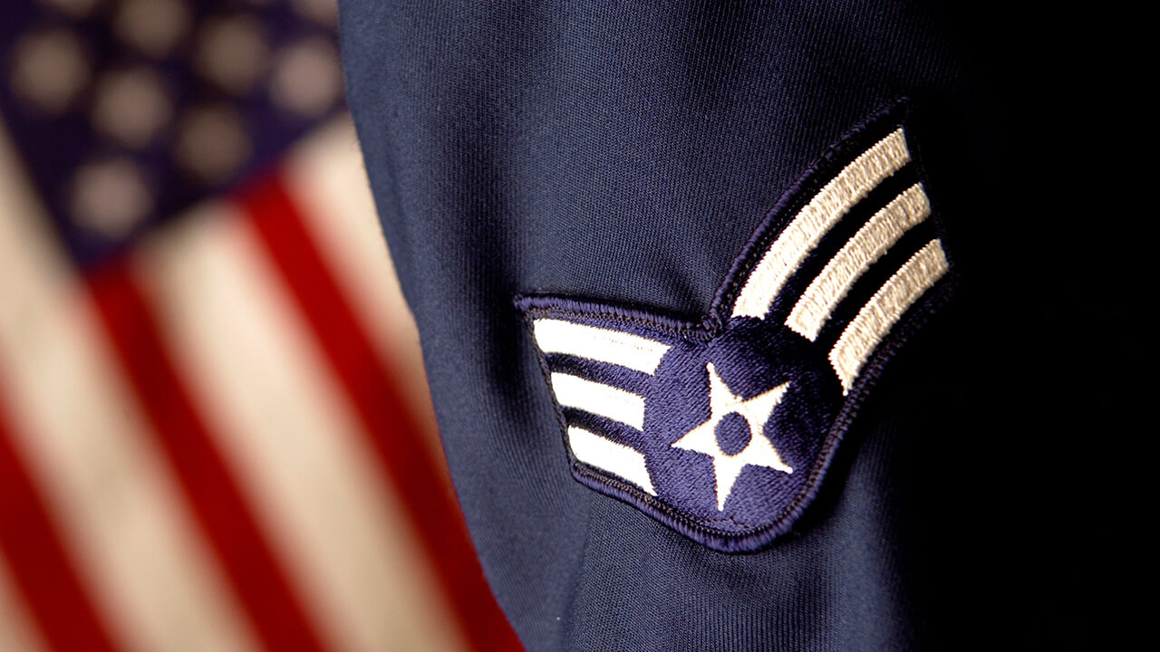 US flag and military uniform